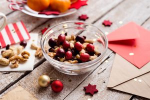 nuts and berries in a glass bowl Christmas theme